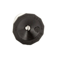 Packaged view of Toro 89-1806 nozzle alongside planting bed, demonstrating compact size and intended use for shrubs and groundcover.