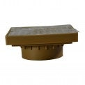 Top view of NDS 920B 6-inch satin brass square grate seated on a low-profile styrene adapter, showing square openings and brass screw attachments.
