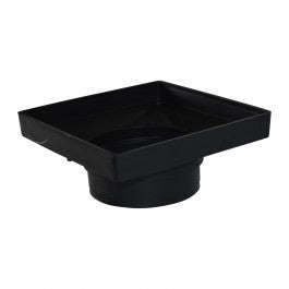 NDS 932 9 in. square low-profile adapter in black HIPS plastic; angled view showing top opening, tapered outlet, and exterior profile.