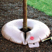 Close-up of the TreeGator Junior Pro 98185 15-gallon bag showing texture, zipper seam and fill tag, suitable for trees and shrubs.