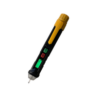 Armada PRO12 voltage detector angled view showing probe tip, sensitivity/button controls, backlit display and integrated flashlight on black handheld housing.