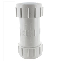 White 1-1/2 inch PVC compression coupling (CPC-1500) front view showing compression nut and gasket, used for irrigation repairs.