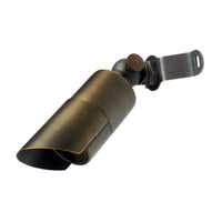 Weathered brass Conquest down light with 360-degree rotational shroud, tempered glass lens, and adjustable brass knuckle for aiming.