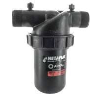 Front view of Netafim DF150-080 1.5 in manual disc filter showing yellow filter body, 1.5 in male inlet and outlet threads, and clamp assembly.