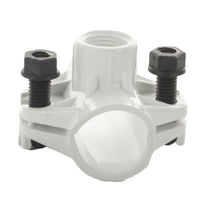 Side profile of KwikSeal DST1x1/2 saddle tee showing low-profile fit and molded barb interface for secure polyethylene pipe connection.