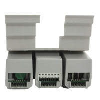 Rear and angled view of DUAL48M module showing mounting edge, three two-wire path connectors, and printed part number label for identification.