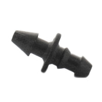 Close view of Netafim EDTUBEBA black 1/4 in barbed adapter for micro-tubing, showing barbed ends and compact body structure.
