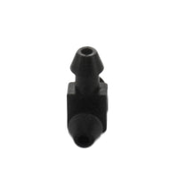 Close-up of the barbed end on the Netafim EDTUBETEE showing the ribbed barb geometry that secures 1/4" micro tubing without clamps or adhesives.