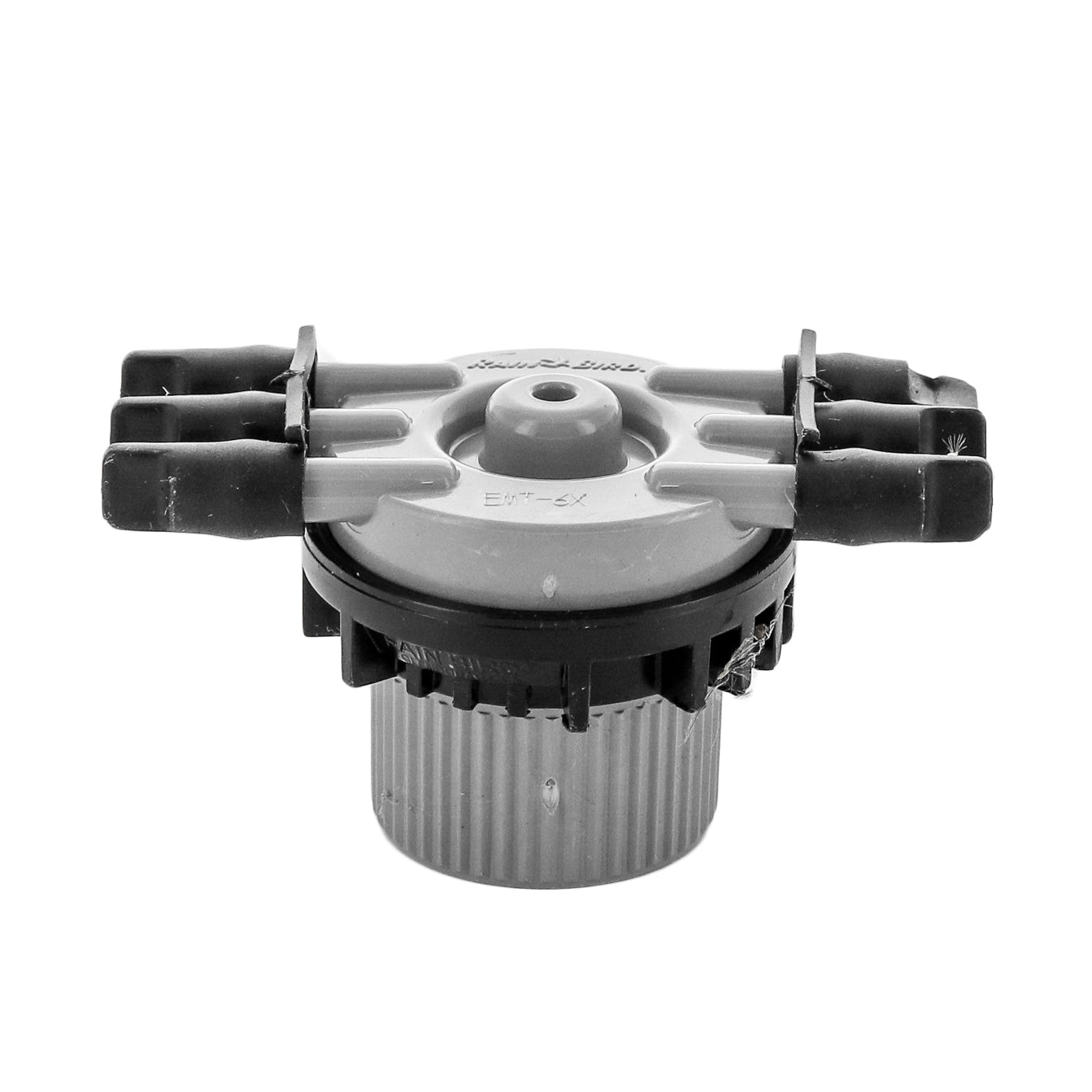 Front view of Rain Bird EMT6XERI 6-outlet drip manifold showing 1/2 in FPT inlet and six capped 1/4 in barb outlets.