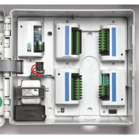 Close-up of controller wiring area and terminal blocks on Rain Bird ESP12LXMEF, highlighting screw terminal connections and modular station ports for installers.