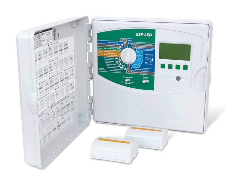 Front view of Rain Bird ESP-LXD 2-wire decoder controller wall-mount enclosure showing LCD display, hand/off/auto dial and wiring compartment.