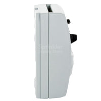 Side view of Rain Bird ESPSM3 expansion module showing side profile, vents, and the sliding edge used to insert into controller slots.
