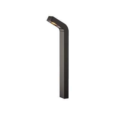 FX M-PJ path light in flat black beside a stone walkway, showing integrated LED head and die-cast aluminum body.