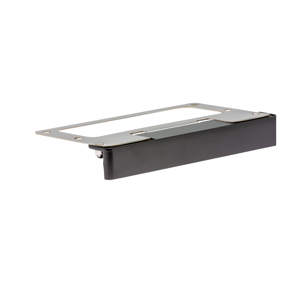 LF wall light in Flat Black finish, low-profile die-cast brass housing, installed under a stone cap with warm 2700K illumination visible.