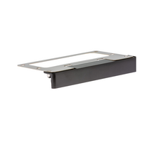 LF wall light in Flat Black finish, low-profile die-cast brass housing, installed under a stone cap with warm 2700K illumination visible.