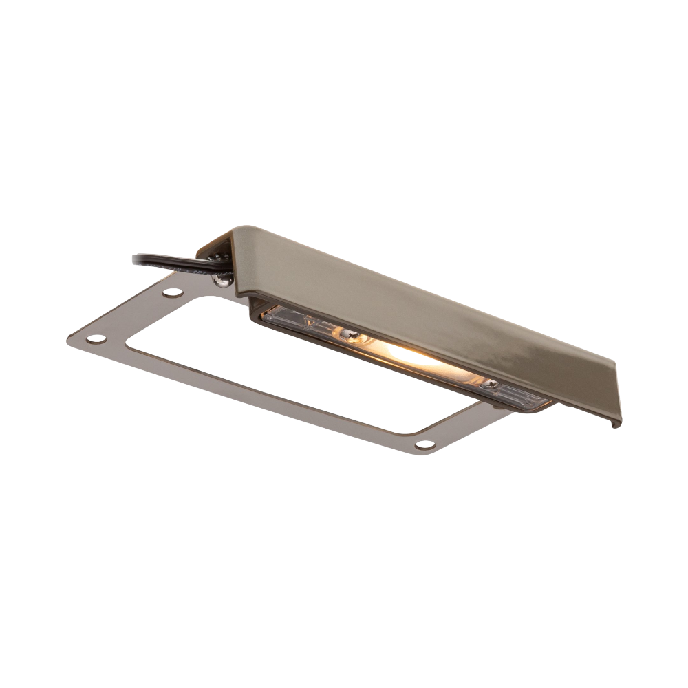 LF wall light in Bronze Metallic finish with die-cast brass housing, under-cap mounting, showing warm output and compact profile on masonry surface.