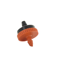 Front view of orange Hunter HE60B25 point-source drip emitter showing self-piercing 1/4" barb inlet and coined grip edge, close-up