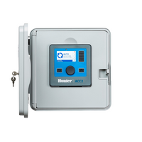 Hunter ACC2 commercial controller, gray metal wall-mount enclosure showing front panel, backlit LCD, terminal wiring connections, and model labeling.