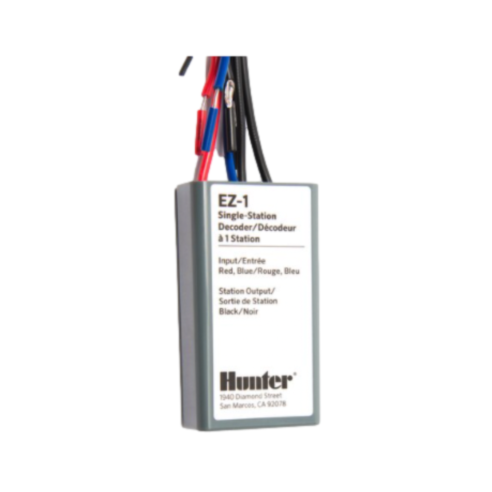 Close-up of Hunter EZ-1 single-station decoder showing terminal connections, color-coded leads, and integrated status LED for diagnostics.