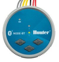 Hunter NODE-BT 2-station Bluetooth battery controller mounted on a valve box, side view with station wiring visible.