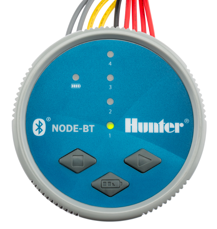 Hunter NODE-BT 4-station Bluetooth battery irrigation controller, overhead view showing four station lead wires and LED indicators.