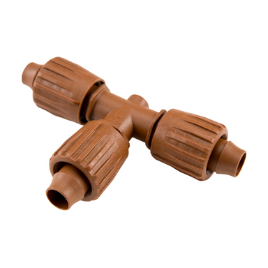 Angled view of Hunter PLD-LOC 17 mm push-on tee in brown, showing threaded locking collar and barbed insertion points for quick push-on installation.