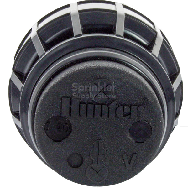 Close-up of the Hunter I-40 rotor nozzle assembly and color-coded nozzles, highlighting the three-port design and nozzle identification.