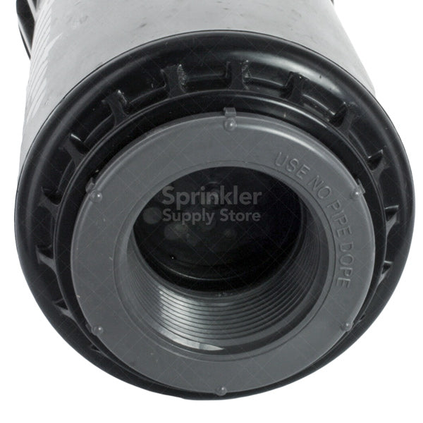 Hunter I-90-36V rotor removed from turf for service showing jar-top access and internal filter screen area.