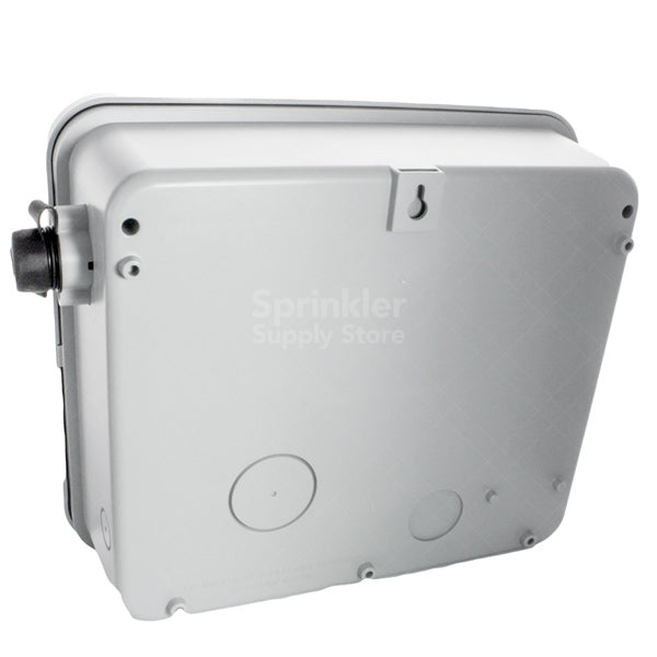 Close-up of Hunter I-Core IC600PL backlit LCD display and control dial on the six-station outdoor plastic controller.