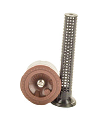 Close-up of IPN-12TQ nozzle showing filter opening, 23° trajectory angle, and durable molded body with non-slip texture.