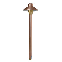 Unique Illuminator 6 path light in natural copper finish with 18-inch riser, frosted cylindrical lens, no lamp included
