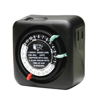Side and angled view of Intermatic TN111RM40 outdoor plug-in timer illustrating compact NEMA 3R-compatible housing, manual override dial and polarized plug configuration.