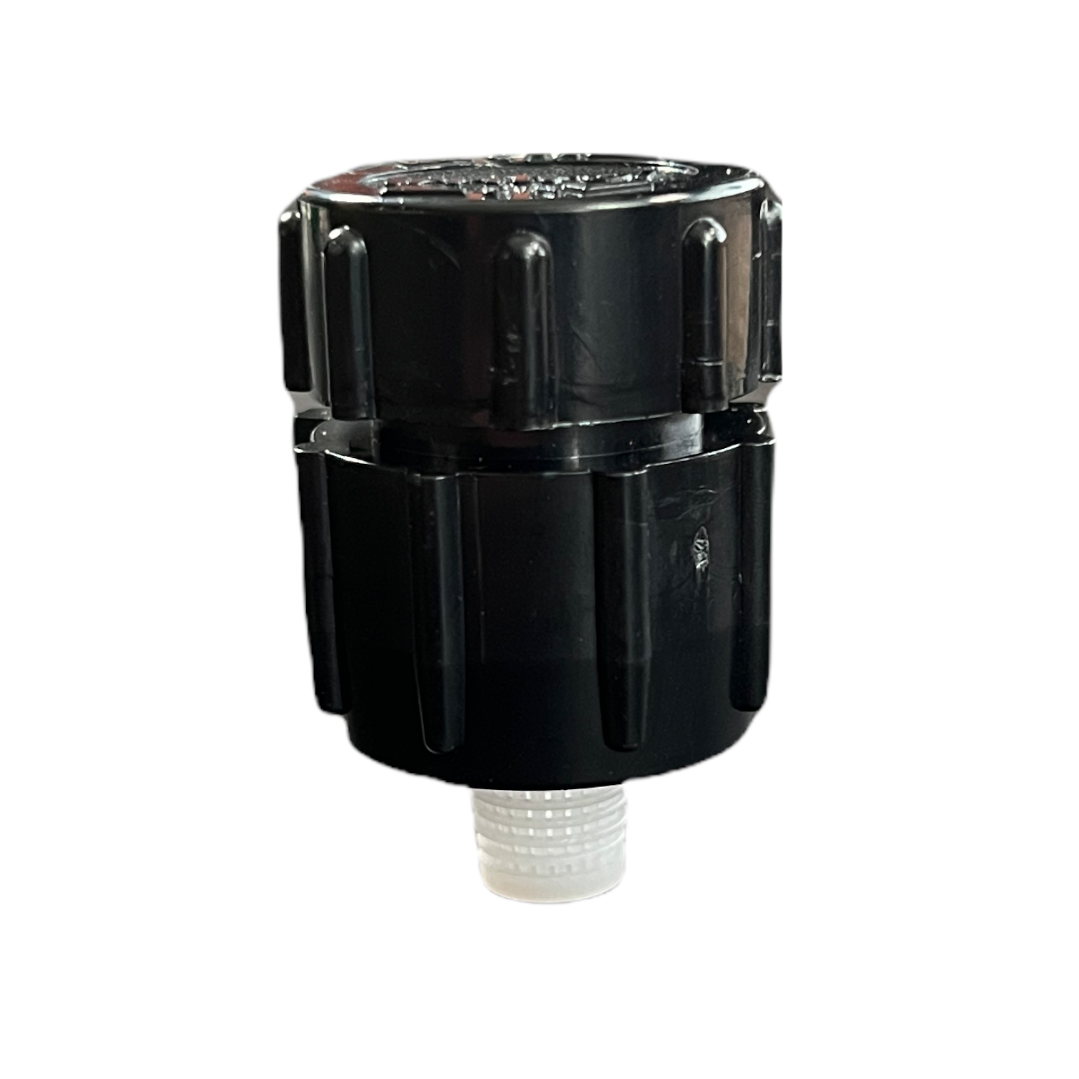 Front-angle photo of an Irritrol 533 adjustable flood bubbler showing the twist-top flow adjuster, 1/2 in female NPT inlet and lavender ABS body for outdoor irrigation.