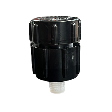Front-angle photo of an Irritrol 533 adjustable flood bubbler showing the twist-top flow adjuster, 1/2 in female NPT inlet and lavender ABS body for outdoor irrigation.