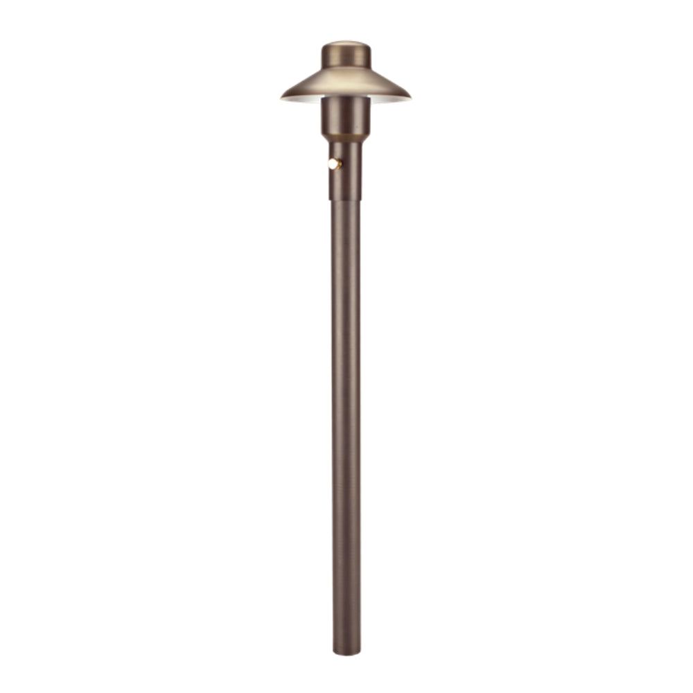 Weathered brass Unique Mercury 4 path light on a 12-inch brass riser showing frosted borosilicate cylindrical lens and low-profile brass housing for pathways.