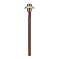 Weathered brass Unique Mercury 4 path light on a 12-inch brass riser showing frosted borosilicate cylindrical lens and low-profile brass housing for pathways.
