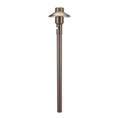 Weathered brass Unique Mercury 4 path light on a 12-inch brass riser showing frosted borosilicate cylindrical lens and low-profile brass housing for pathways.