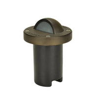 Top view of Nova Eyelid in-ground light in weathered brass finish showing eyelid shroud, no lamp installed, with 25 ft lead.