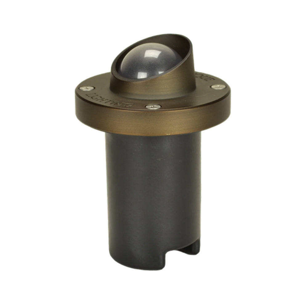 Unique Nova in-ground well light shroud in weathered brass finish, round die-cast brass top and recessed lens, no lamp shown.