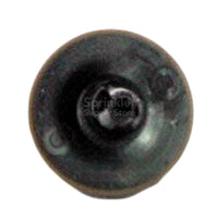 Side view of Rain Bird PC12 emitter installed in 1/4" distribution tubing, highlighting self-piercing barb and compact profile.