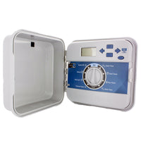 Front view of Hunter PCC1200 12-station outdoor irrigation controller in closed weather-resistant plastic cabinet, model label visible.