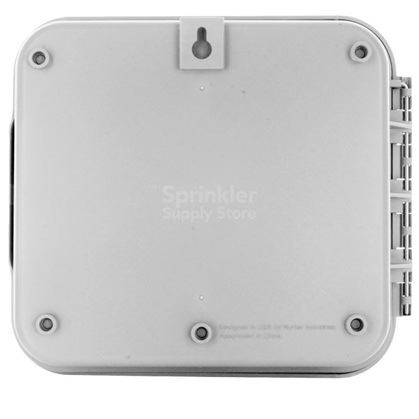 Side-angle view of the Hunter PCC1200 12-station outdoor controller showing enclosure and mounting points for wall installation.