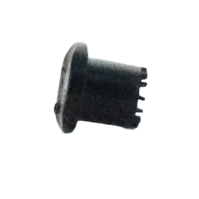 Close-up of the diffuser cap's underside and outlet that directs water to the root zone while preventing washout and splatter.