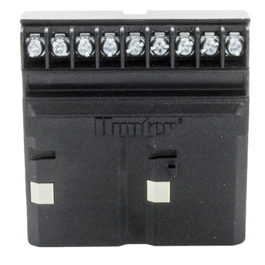 Hunter PCM-900 9-station module installed next to a Pro-C controller showing plug-in location and Power Lock connector engagement details.