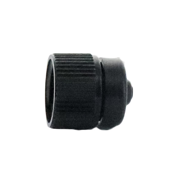 Close-up of Rain Bird PCT05 pressure-compensating module showing cap color, outlet port, and 1/2 in FPT threading for riser attachment.