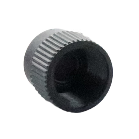 Rain Bird PCT07 assembled on a 1/2-inch PVC riser, showing installation compatibility and compact bubbler footprint.
