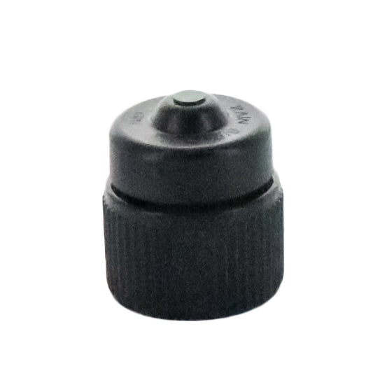 Front view of Rain Bird PCT10 green pressure-compensating threaded bubbler showing color-coded cap, outlet and 1/2 in FPT inlet for riser mounting.