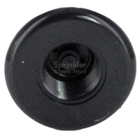 Perspective product shot of a PGP ULTRA pop-up rotor installed in soil, showing retracted head, exposed diameter, and pop-up construction.