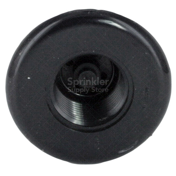 Perspective product shot of a PGP ULTRA pop-up rotor installed in soil, showing retracted head, exposed diameter, and pop-up construction.