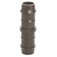 Front-angle view of Hunter PLD-CPL 17mm barb-to-barb coupling in brown glass-filled polypropylene, showing both barbed ends and body profile.